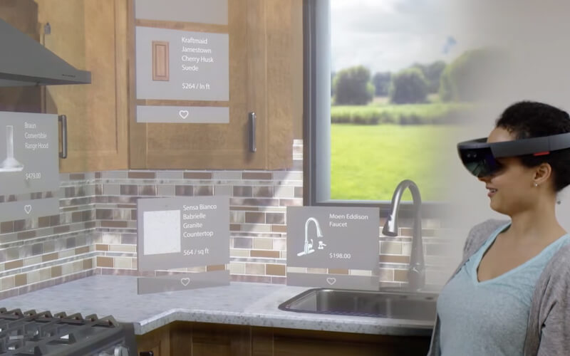 Female customer wearing Microsoft HoloLens, immersed in a AR kitchen remodeling experience. 